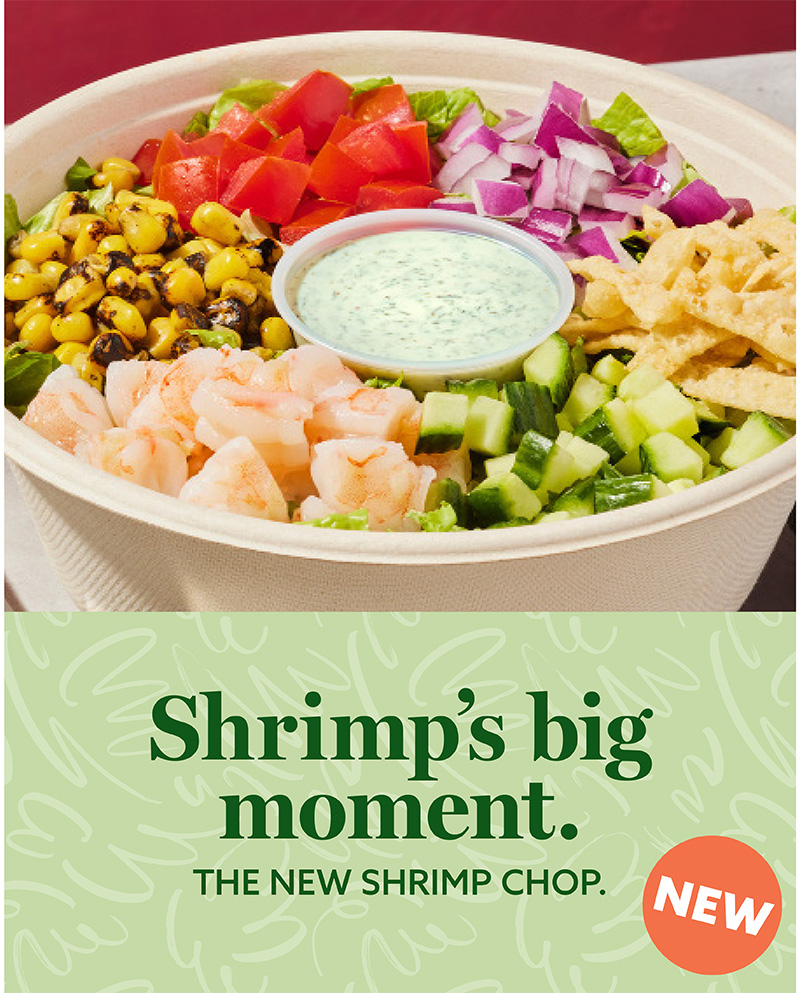 A bowl of shrimp salad with various fresh vegetables and a cup of creamy dressing in the center. The text below reads, 